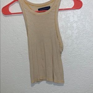 yellow and white striped tank